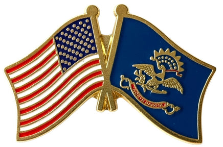 A double flag pin with the American flag on the left and the North Dakota state flag on the right.