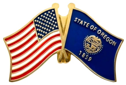 A double flag pin with the American flag on the left and the Oregon state flag on the right.