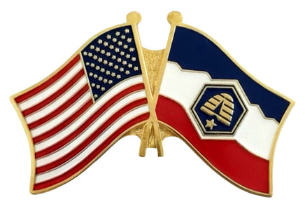 A double flag pin with the American flag on the left and the Utah state flag on the right.